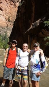 Randy with father and son hiking in Zion