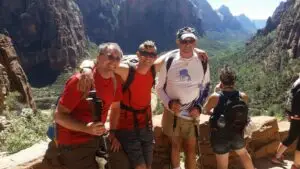 Randy with father and son hiking in Zion